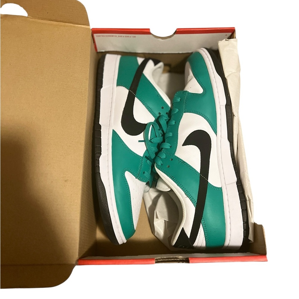 Green , white , black Nike dunks